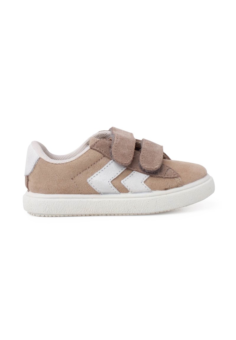 Tan suede shoes with white accents, featuring a double Velcro strap and zigzag design on the side, and a white rubber sole.