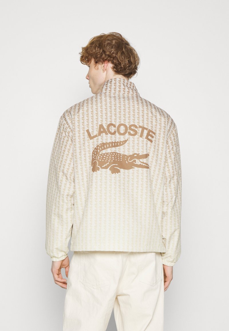 Lacoste Veste de survêtement marron beige blanc/beige ZALANDO.FR