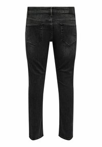 Svart denim jeans med slim fit, med baklommene, kontrasterende gul søm og klassisk femlomme-design.