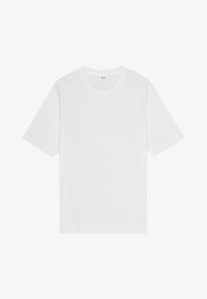 Valkoinen puuvillateepaita lyhyillä hihoilla, pyöreällä kaula-aukolla ja suorahkolla helmalla. Sileä pinta, minimalistinen muotoilu, ei näkyviä kuvioita tai koristeita.