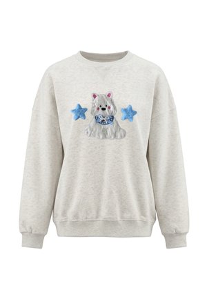 Lyse beige sweatshirt med en struktureret hvid hund iført en blå ternet butterfly mellem to blå stjerner foran.