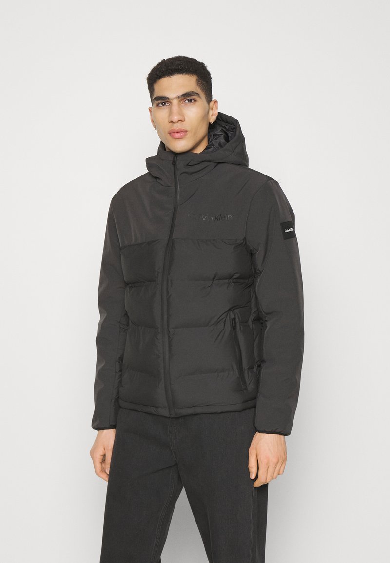 Calvin Klein MIX MEDIA QUILT JACKET HOOD - Veste d'hiver - black/noir ...