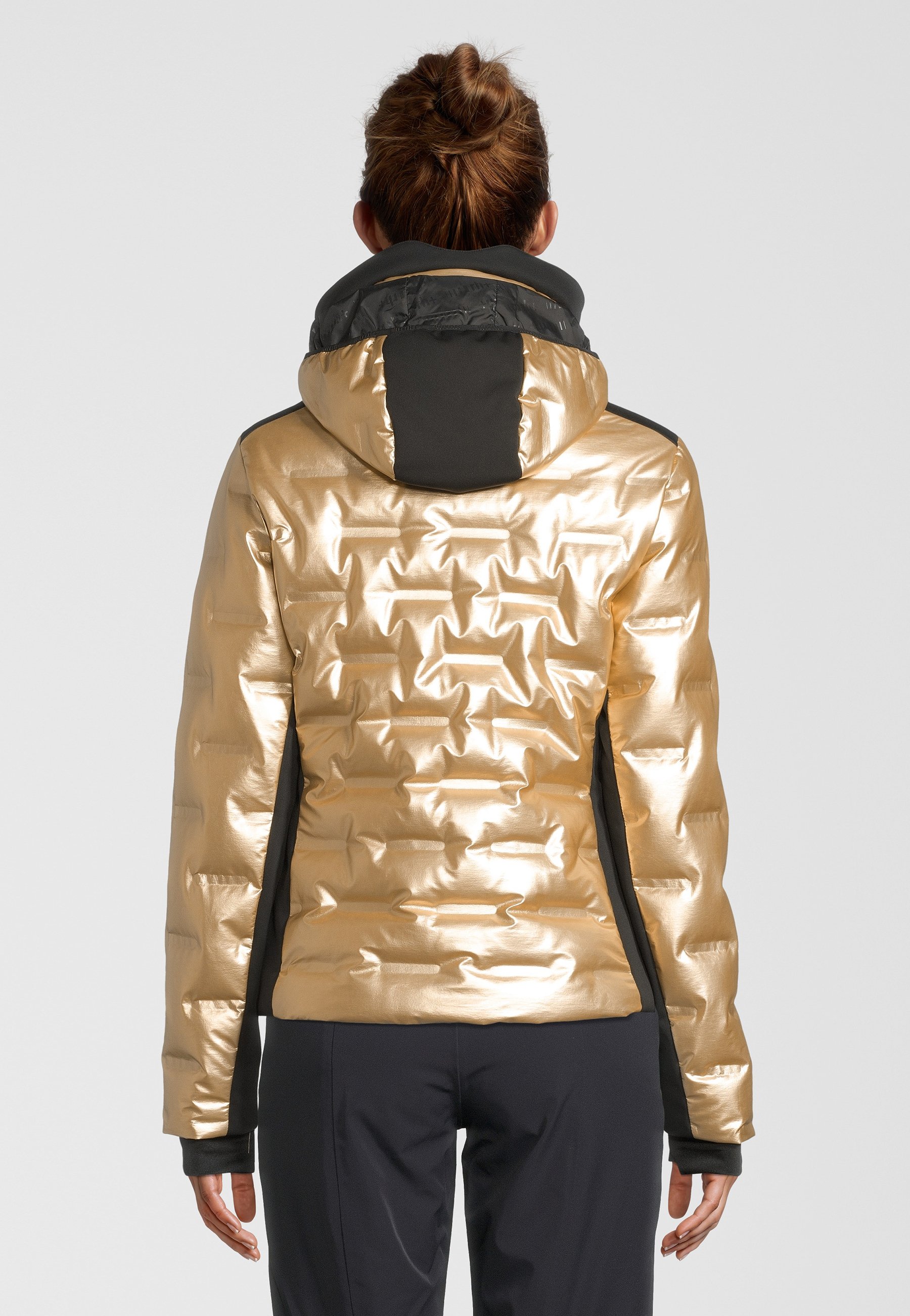 black and gold north face vest