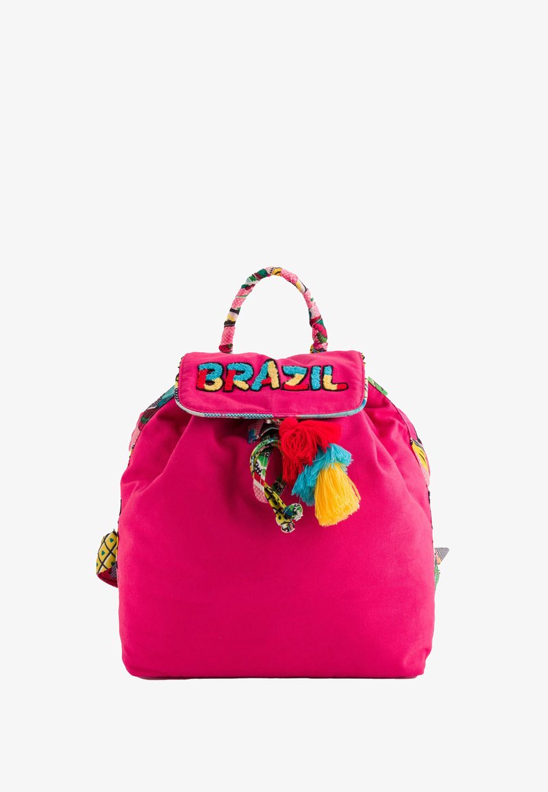 Pink fabric backpack featuring a top handle, colorful tassels, and a decorative flap with the word "BRAZIL" in vibrant letters.