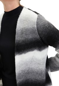 Cartoon Kofta - black