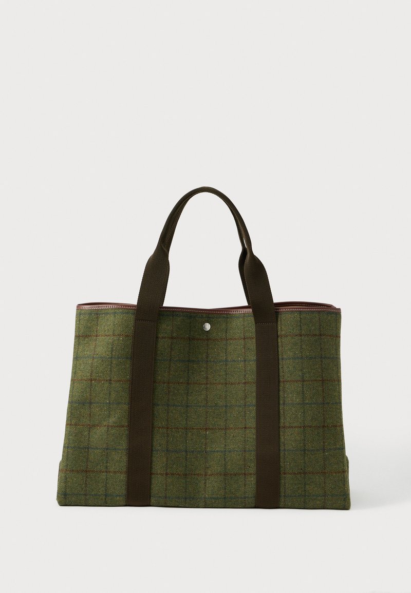 Zelená vlněná taška na rameno s hnědým mřížkovým vzorem, tmavohnědými uchy a jednou stříbrnou knoflíkovou sponou na horním středu.