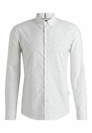 Hvid skjorte med lange ærmer, der har et subtilt mønster af små blå prikker, knap-down krave og en lige kant med afrundede kanter.