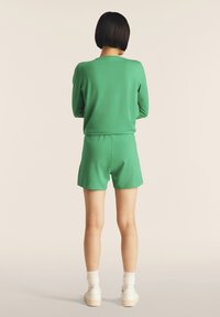 Freddy GIROCOLLO CON PERLINE SUL FRONTE - Sudadera - bright green