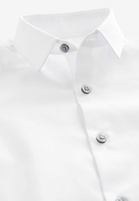 Next Pluus - white