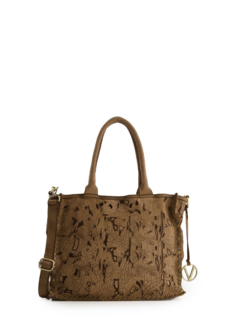Braune Leder-Tote-Tasche mit floralem Ausschnittdesign, zwei Griffen, verstellbarem Schulterriemen und Akzenten aus goldfarbenem Metall.