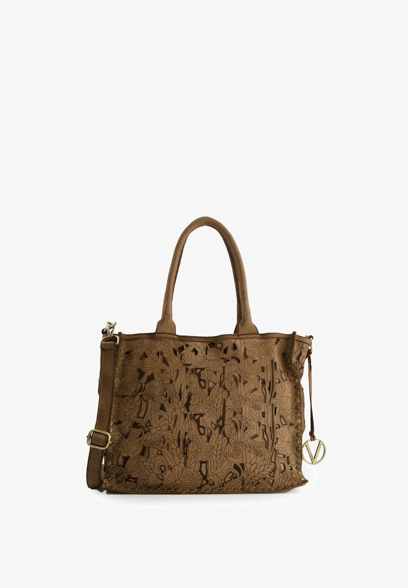Braune Leder-Tote-Tasche mit floralem Ausschnittdesign, zwei Griffen, verstellbarem Schulterriemen und Akzenten aus goldfarbenem Metall.