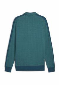 Teal langærmet trøje med en herringbone tekstur, kontrasterende mørkeblå accenter på skuldrene samt ribbede manchetter og kant.
