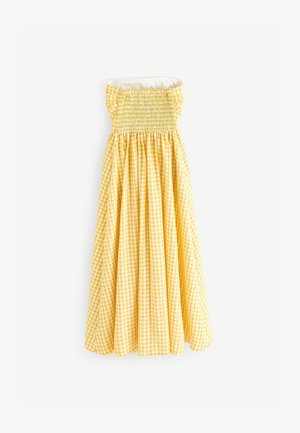 Rochie galbenă din țesătură gingham, cu un bust elastic și decolteu fără bretele. Are o fustă fluidă, cu material plisat. Textură netedă pe întreaga suprafață.