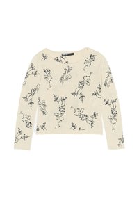Un pull couleur crème avec un imprimé floral noir, des manches longues, un col rond et un design légèrement court. Tissu texturé.