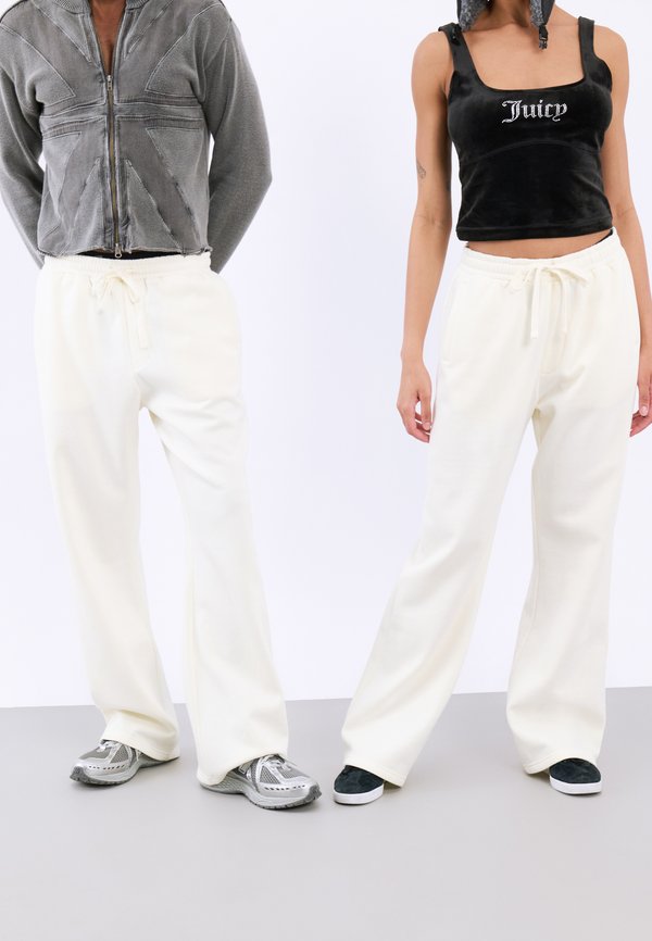 UNISEX - Tracksuit bottoms - egret
