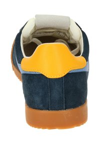 Navy suede sneaker with a yellow leather heel tab, light blue accents, and a gum rubber sole. Features padded collar for comfort.