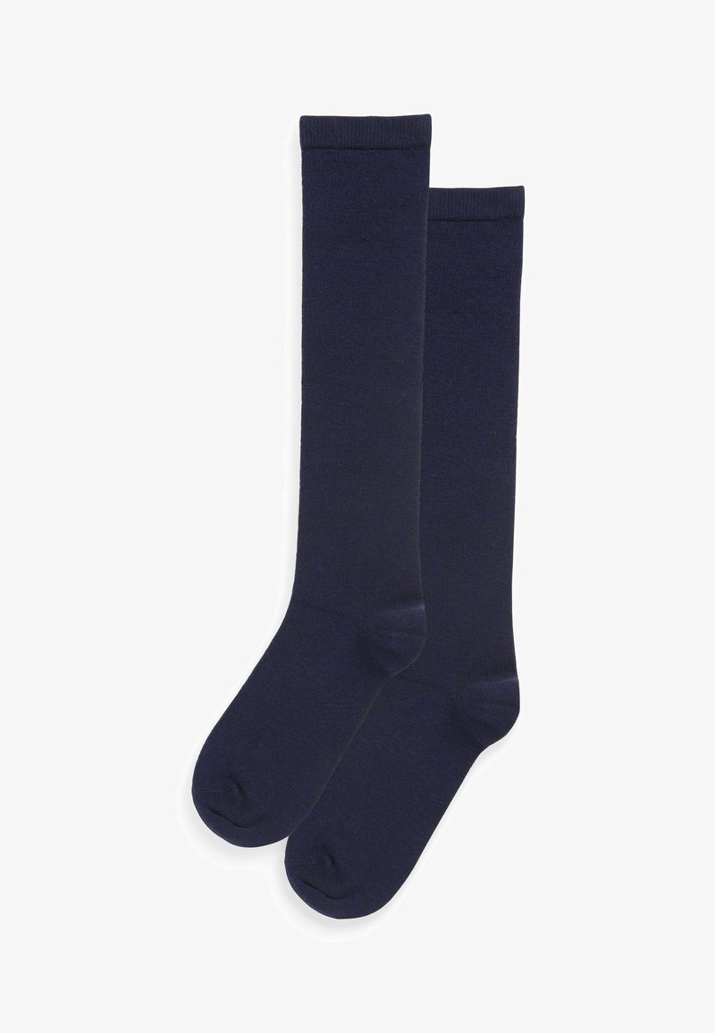 Calze al ginocchio di un blu navy scuro, realizzate in un materiale a maglia morbido. Presentano una texture liscia con un polsino a coste nella parte superiore.