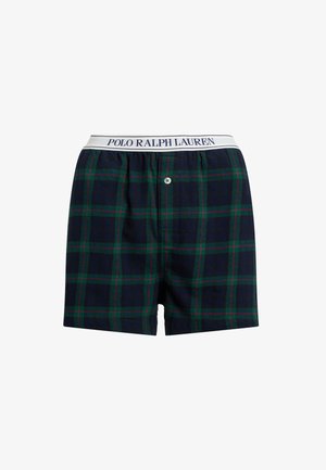 Bañadores en cuadros azul oscuro, con líneas verdes y rojas, y una cinturilla elástica blanca etiquetada "POLO RALPH LAUREN". Cierre frontal con botón.