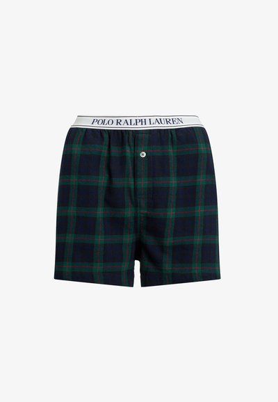 Boxershorts i mörkblå rutigt mönster, med gröna och röda linjer, samt en vit elastisk midjeband märkt "POLO RALPH LAUREN." Framsknappsstängning.