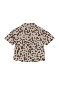 Kortärmad skjorta i ljus beige tyg med ett leoprintmönster i brunt, med en spetsig krage och två framfickor.