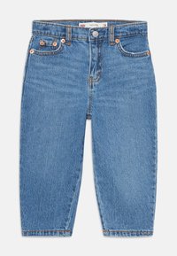 Jeans en denim bleu clair au design ample en forme de baril. Présentent des coutures orange, une fermeture à boutons et des poches avant. Style classique à cinq poches.