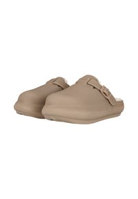 Beige klumpur, laget av teksturert syntetisk materiale, med en dekorativ spenne og myk fôr. Lavprofil design med rund tå.