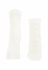 Weiße Socken mit einem dezenten Tiermuster, ausgestattet mit einer glatten Textur und einem gerippten Bündchen. Sie sind auf Komfort und Atmungsaktivität ausgelegt.