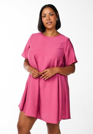 Short pink dress with short sleeves, round neckline, and flowing skirt. Textured fabric with tonal seam detail throughout.