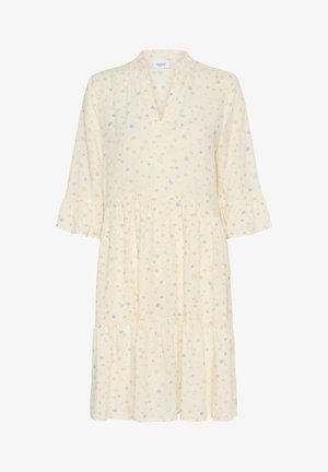 Vaaleankeltainen mekko, jossa on V-pääntie, kolmen neljänneksen hihat ja rypytykset hihoissa. Kukallinen kuvio sinisen, vaaleanpunaisen ja vihreän sävyissä. Kerroksellinen malli.