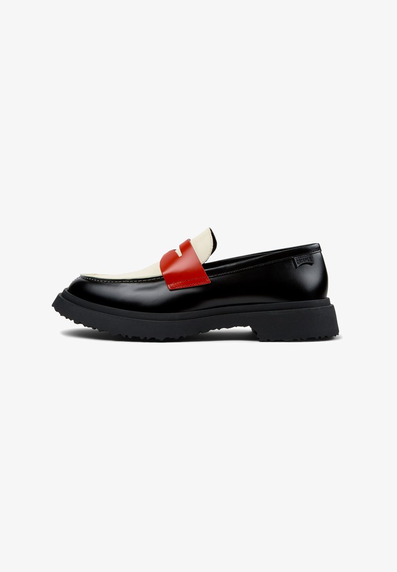 Svarta läderloafers med ett vitt och rött spänne, gummisulor med lugg och kontrasterande sömdetaljer. Snygg design med platt klack.