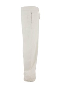 Lichtbeige, losse broek met een elastische tailleband en trekkoord. Voorzien van zijzakken en een gladde stofstructuur.