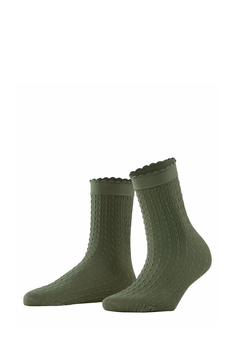 Oliwkowe skarpetki sięgające kostek z teksturowaną powierzchnią, falbankowym wykończeniem i dopasowanym kształtem. Wykonane z miękkiego materiału dla większego komfortu.