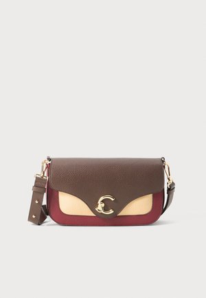 Brown, beige, and burgundy leather shoulder bag with gold clasp and adjustable strap on white background.