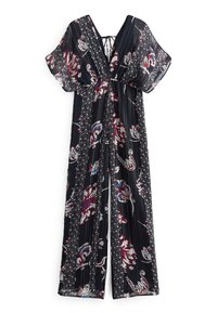 Combinaison à motif floral noire, présentant un décolleté en V, des manches larges et un dos à cordon. Le tissu a une apparence texturée et légère.