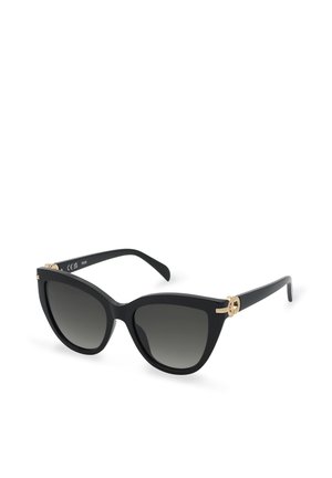 Lunettes de soleil œil-de-chat noires avec verres dégradés foncés et petit détail de logo doré sur les branches, présentées sur fond blanc.