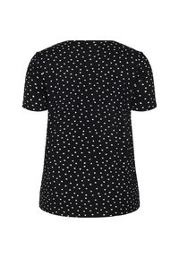 Chemise noire à manches courtes avec petits pois blancs éparpillés, vue de dos sur fond blanc.