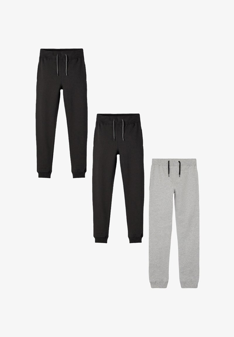 Three pairs of jogger pants: two black, one gray. Each features an elastic waistband and drawstring, with ribbed cuffs at the ankles.