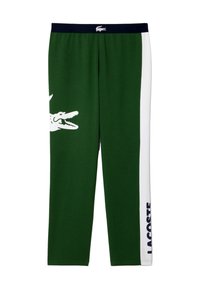 Zöld pamut joggers fehér oldalsávval, nagy krokodil grafikával és kék "LACOSTE" felirattal az alsó lábszáron. Rugalmas derekú.