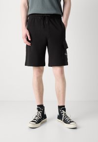 Calvin Klein Jeans CITY GRID  - Pantalones deportivos - black