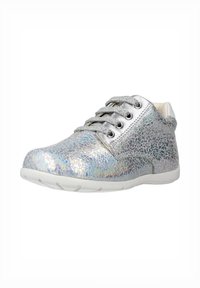 Silver high-top sneaker featuring a textured, iridescent upper, metallic eyelets, and a white rubber sole. Laces are silver.