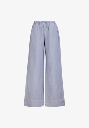 Lichtblauwe wijde linnen broek. Voorzien van een elastische tailleband en zijzakken. Gladde textuur met gestikte zoomdetails.