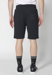 Koroshi BERMUDA JOGGER - Kratke hlače - black