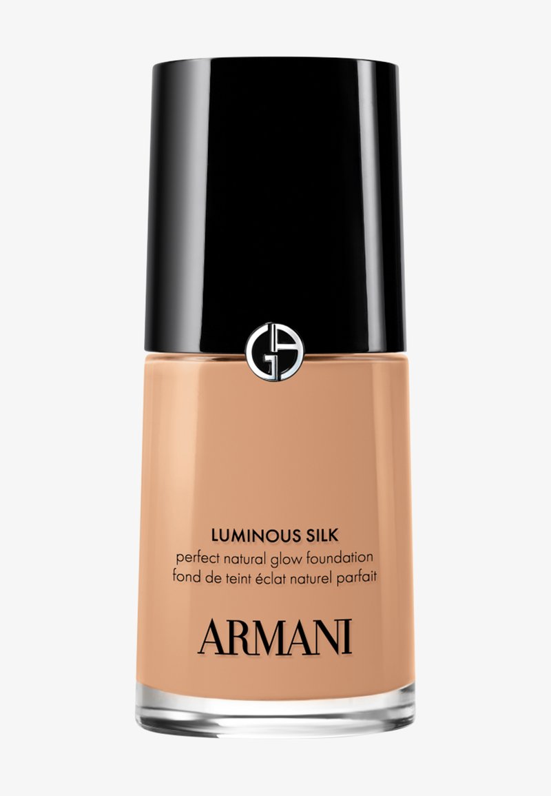 Bottiglia di fondotinta Armani Luminous Silk in beige con tappo nero e logo, etichettata per un effetto naturale e luminoso.