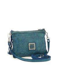 Borsa a tracolla blu in pelle con finitura testurizzata, chiusura con zip, borchie decorative in metallo e tracolla removibile. Accentuata da frange.