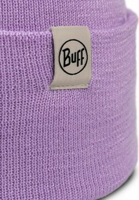 Lavender knit beanie with a folded cuff. Features a fabric tag with "Buff" logo in a circular design. Soft texture and stretchable fit.