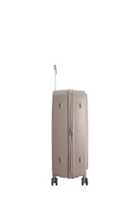 Hardshell suitcase in light beige, featuring a horizontal zip closure, retractable handle, and four dual-wheel casters for mobility.