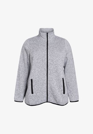 Grå zip-jakke i tekstureret stof, med stående krave, sort lynlås og sidelommer med sorte detaljer. Glat overflade, løs pasform.