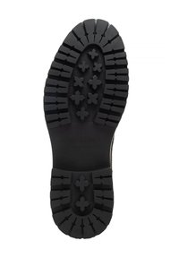 Czarna gumowa podeszwa z głębokim bieżnikiem, wyposażona w wzory krzyżowe zapewniające przyczepność. Solidna konstrukcja i gładkie wykończenie, opatrzona napisem "WITTCHEN handmade".