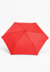 Red umbrella with a smooth, waterproof fabric canopy, eight spokes, and a black fastening button at the center. Flat-topped design.