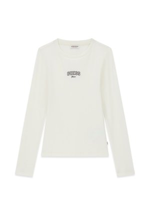 Haut blanc en coton à manches longues avec texture côtelée. Comprend le logo "GUESS Jeans" brodé en gris foncé sur le devant. Encolure ronde, design simple.